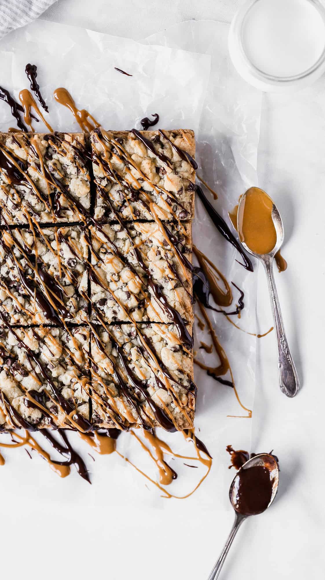 chocolate chip cookie butter bars drizzled in chocolate