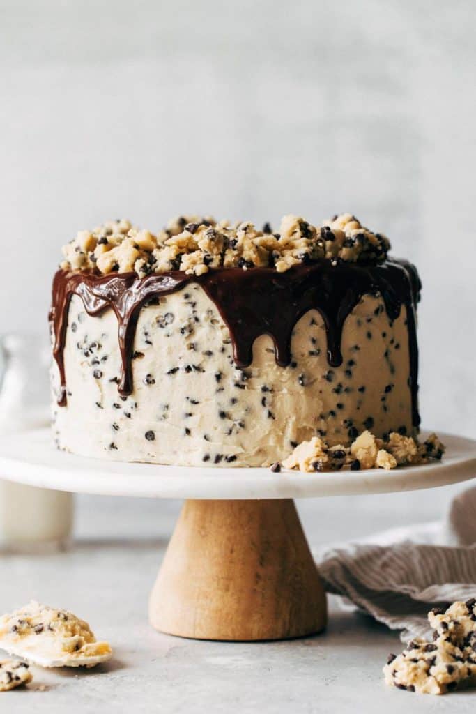 cookie dough cake on a cake stand
