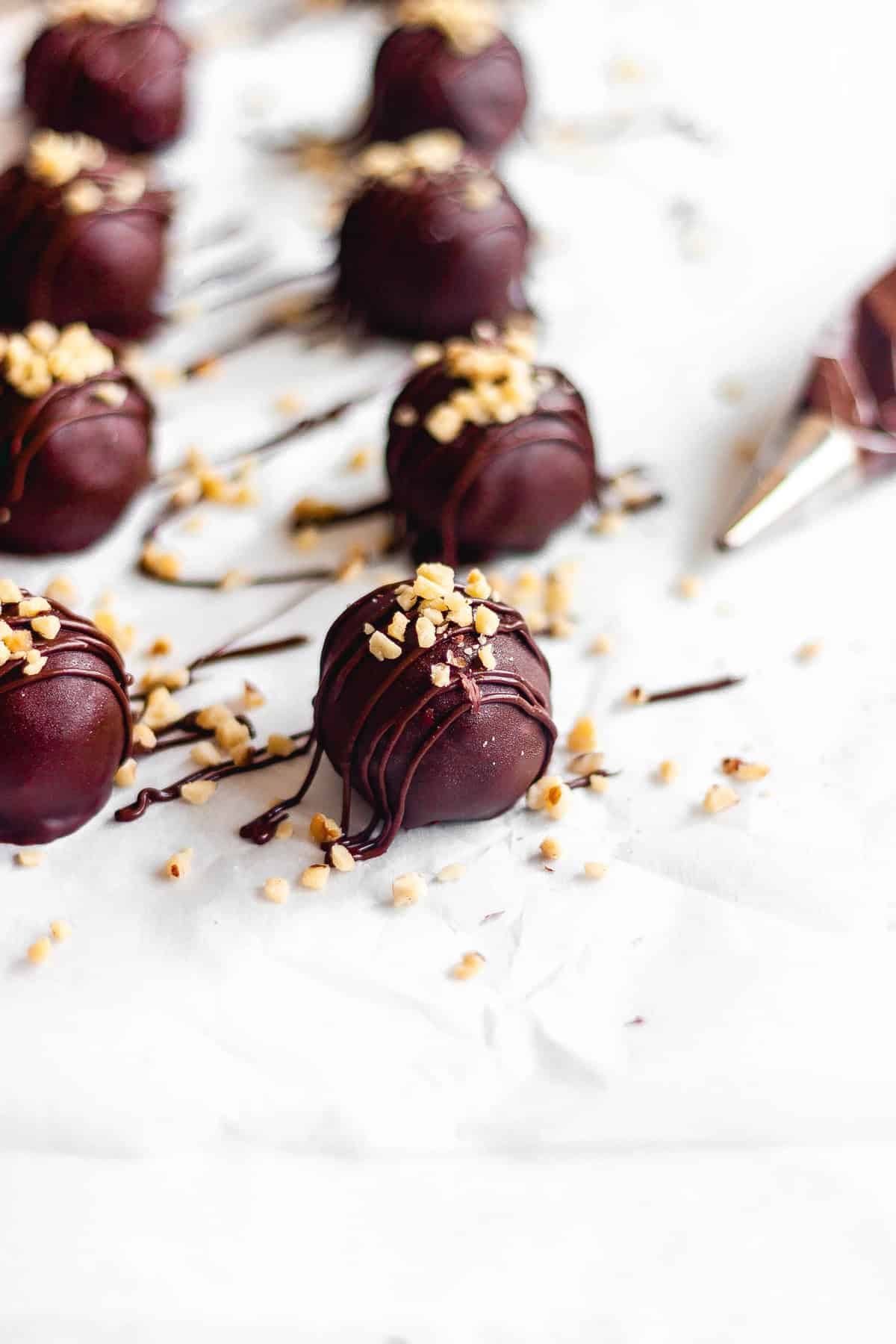 Caramel filled nutella truffles drizzled in chocolate