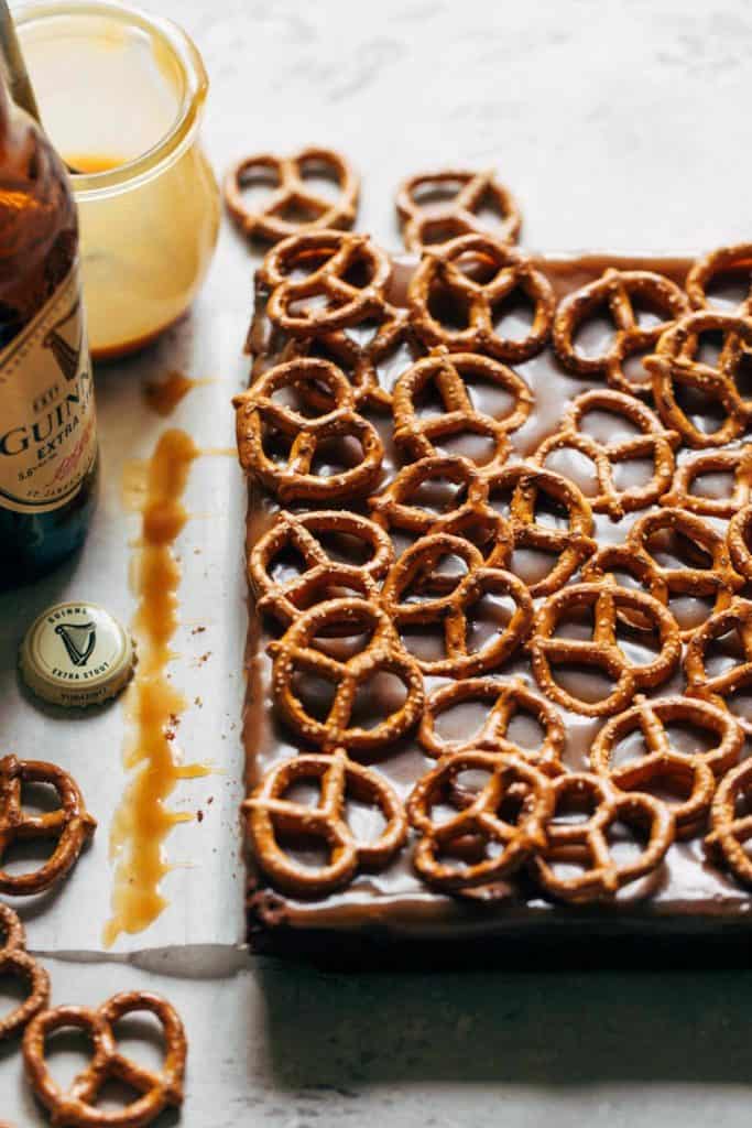 brownies with caramel and pretzels on top