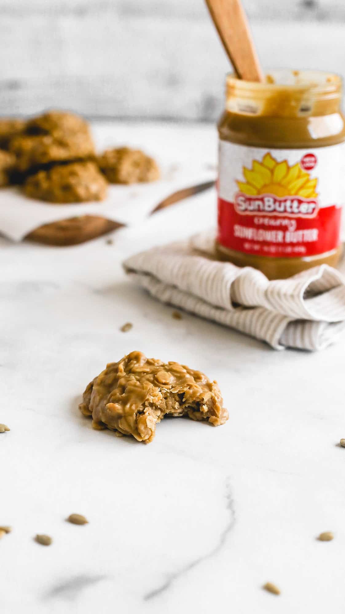 a sunflower seed butter cookie with a bite taken out