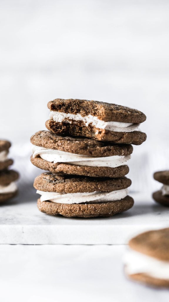 a stack of three gingerbread sandwich cookies