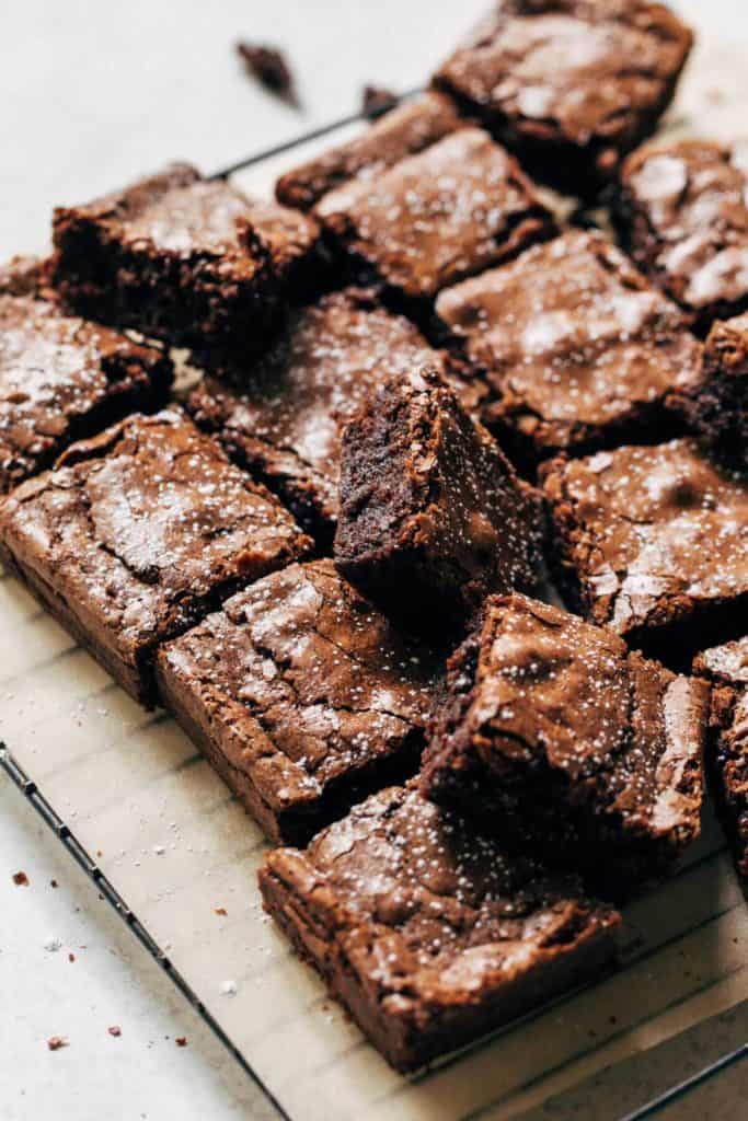 sliced brownies scattered on a cooling rack