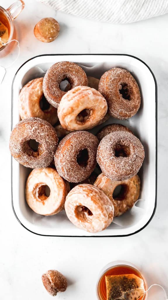a tray full of chai spiced old-fashioned donuts
