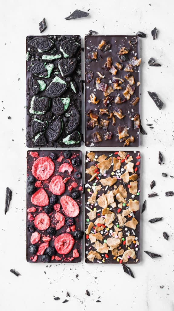 homemade dark chocolate bars with a variety of toppings