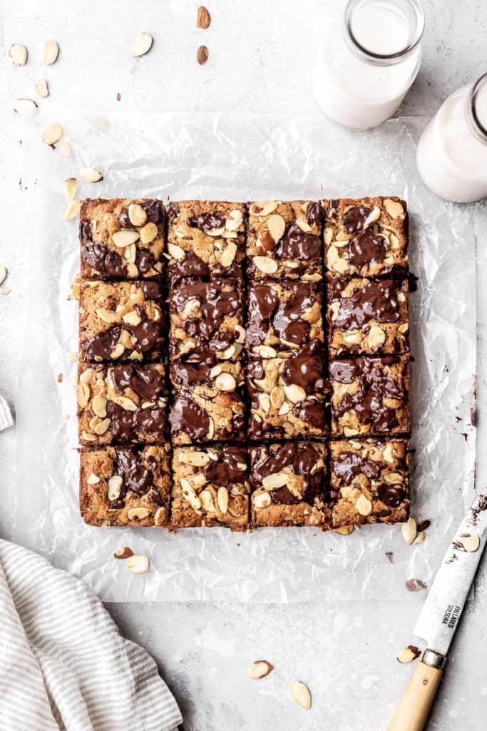 almond chocolate chip cookie bars cut into squares