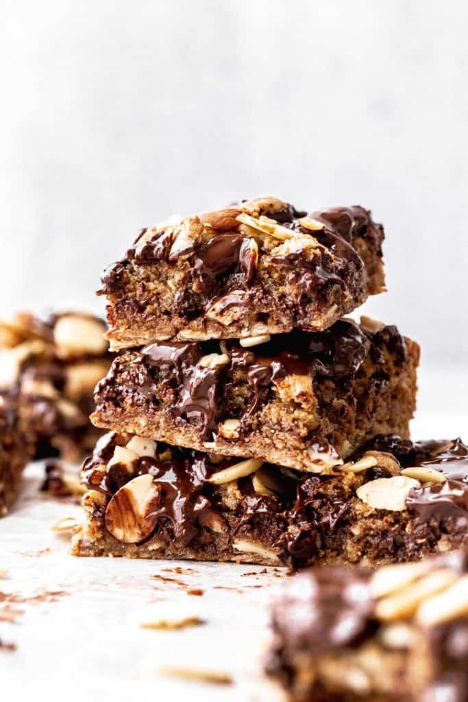a stack of almond butter chocolate chip cookie bars