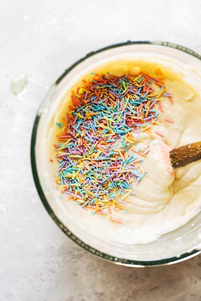 a bowl of cake batter with homemade sprinkles