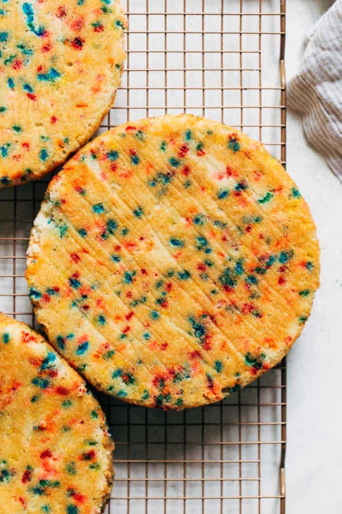 a layer of funfetti cake on a cooling rack