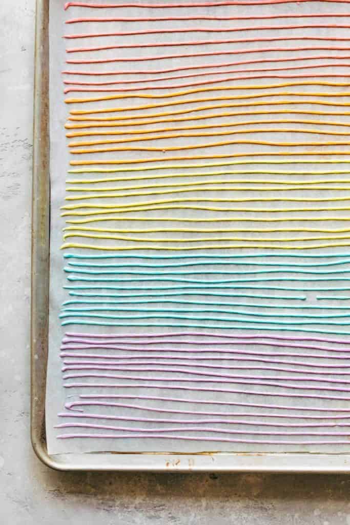 rows of homemade sprinkles on parchment paper