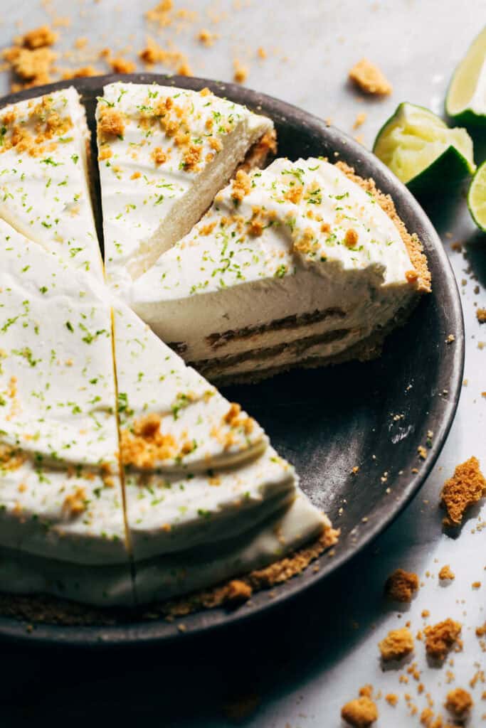 slices of key lime cookie pie in a pan