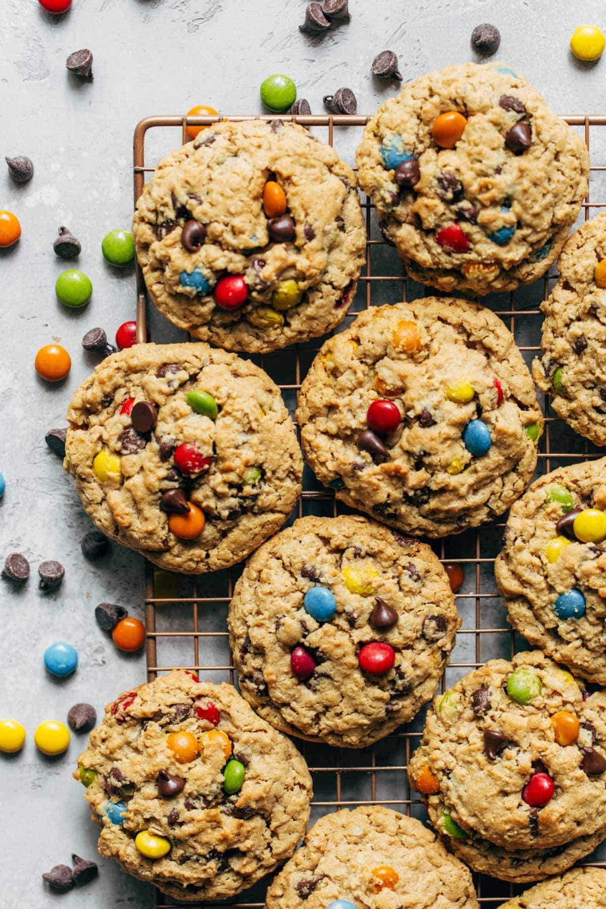 a cooling rack covered in monster cookies