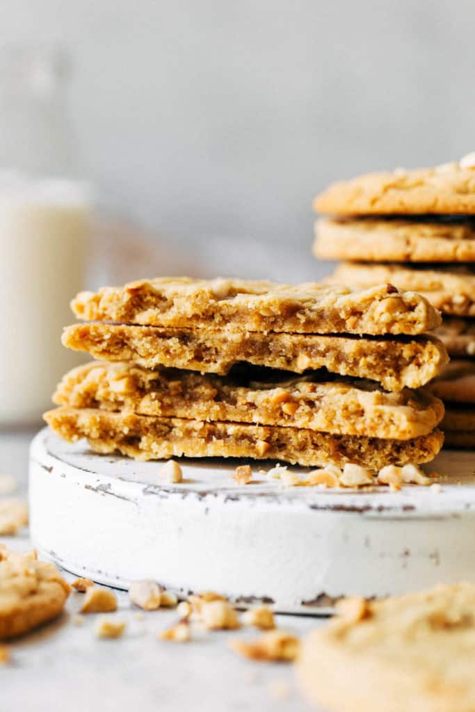 the inside of two thin and chewy peanut butter cookies