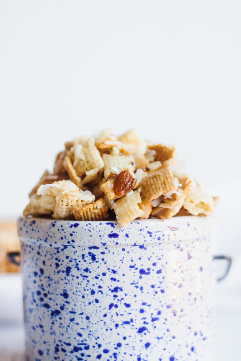 Coconut almond crunch in a tiny blue speckled crock