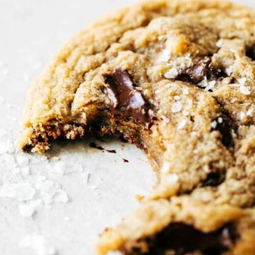 a brown butter chocolate chip cookie with a bite taken out