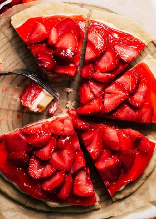 the top of a fully sliced strawberry pizza