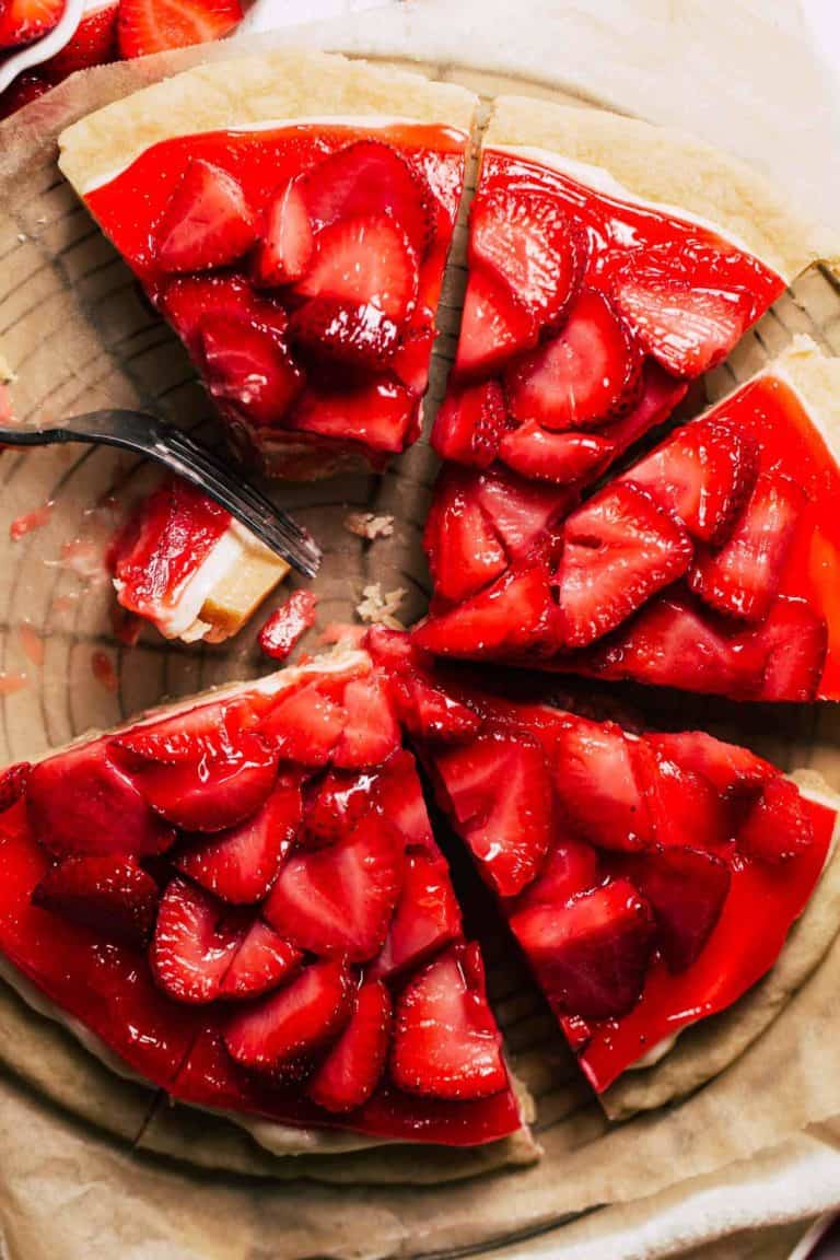 the top of a fully sliced strawberry pizza