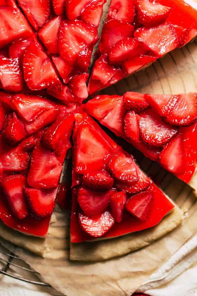 close up on slices of strawberry pizza