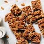 sliced blondies scattered on parchment paper