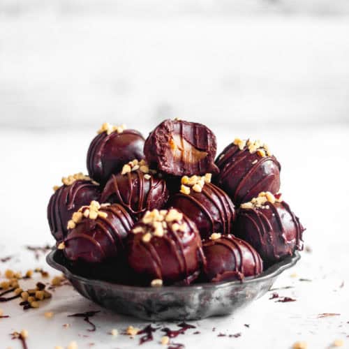 caramel filled nutella truffles piled high in a vintage metal dish