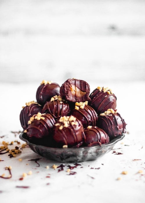caramel filled nutella truffles piled high in a vintage metal dish