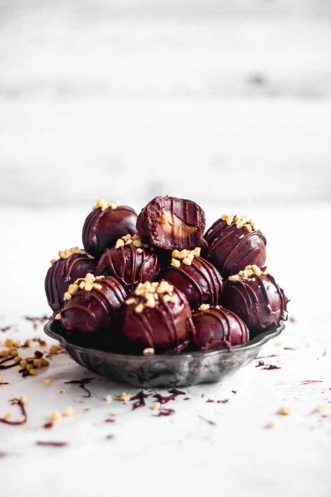 caramel filled nutella truffles piled high in a vintage metal dish