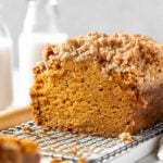 pumpkin bread cut in half to show moist texture inside