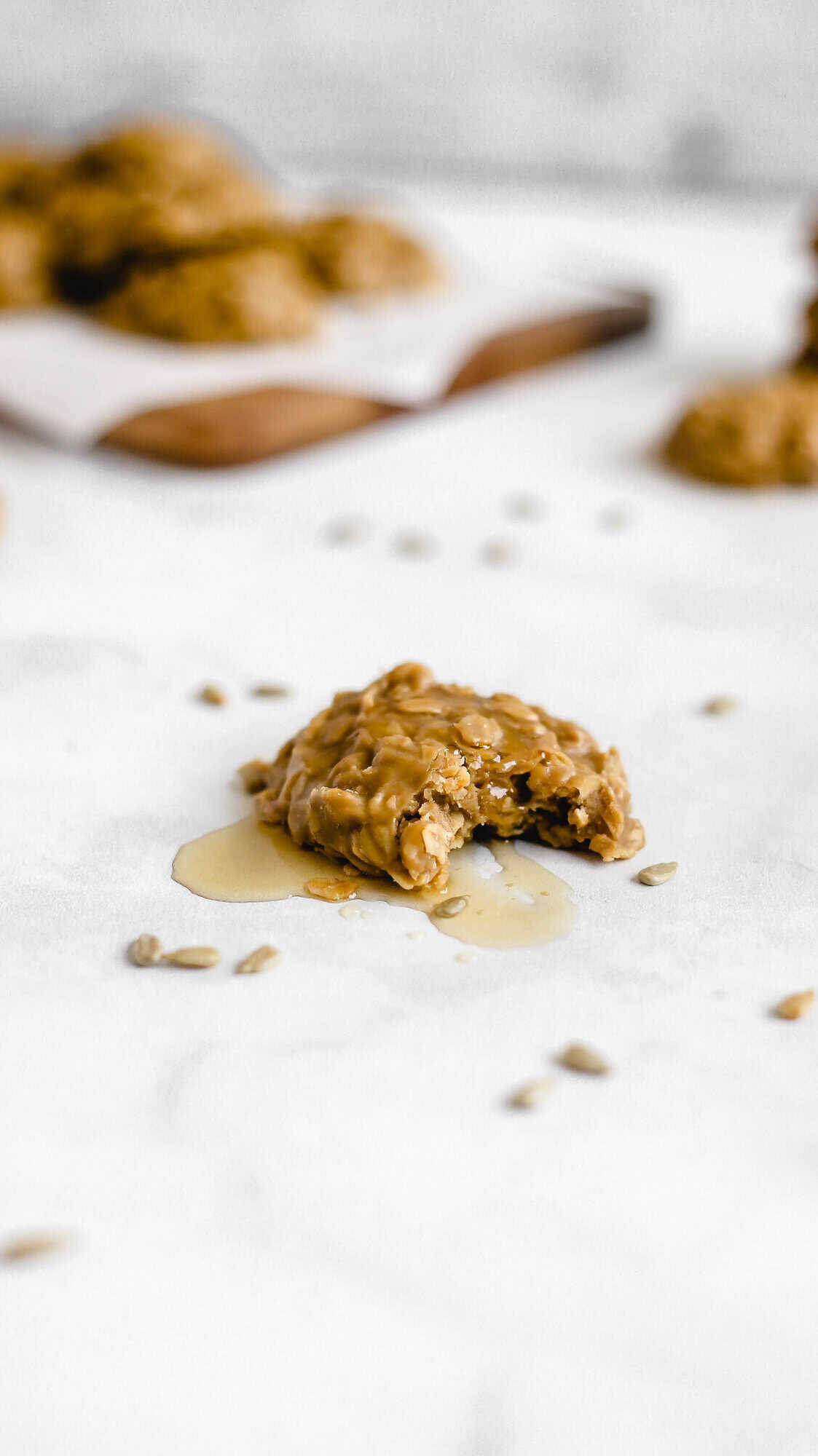 a sunflower seed butter cookie with a bite taken out