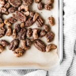 a baking tray of candied nuts