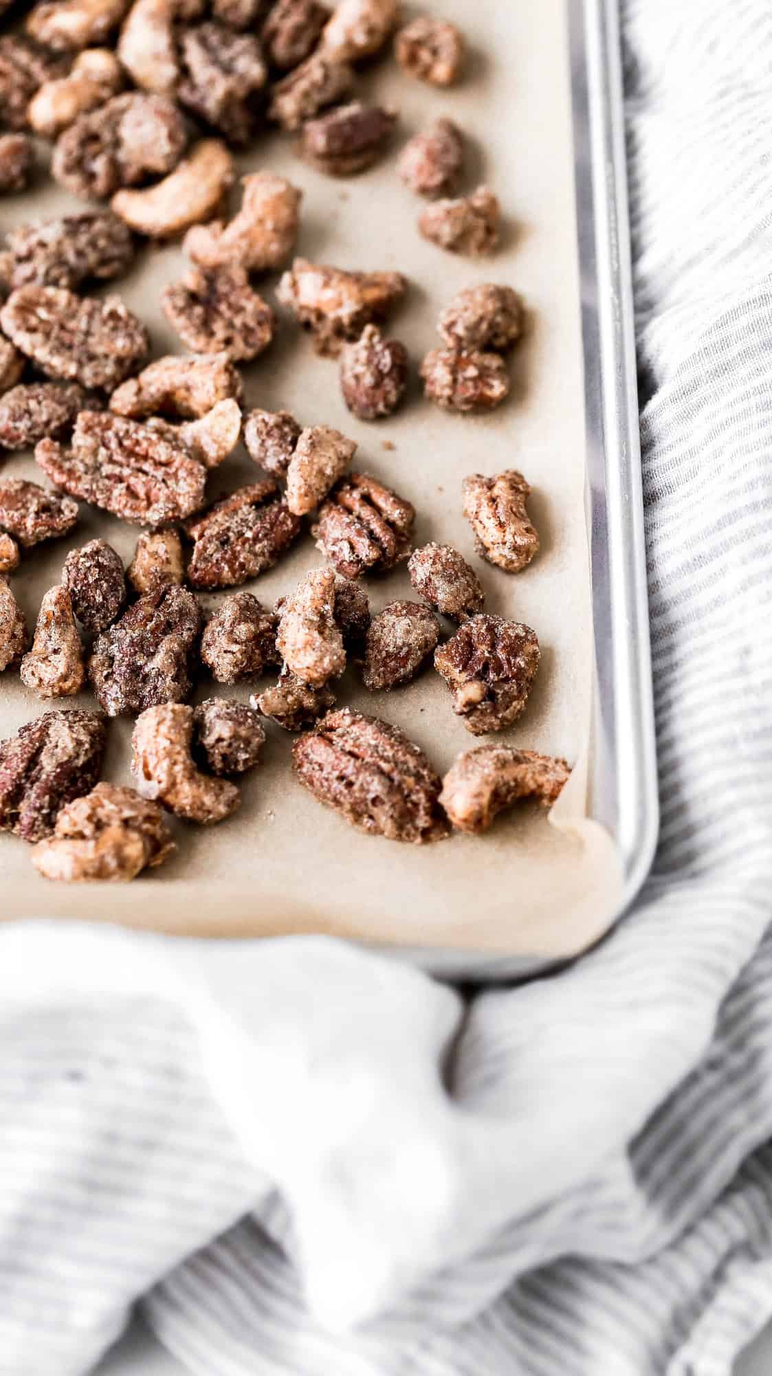 a baking tray of candied nuts