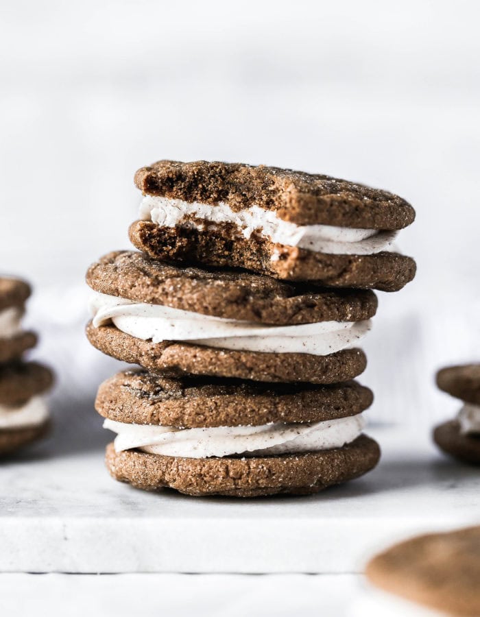 a stack of three gingerbread sandwich cookies