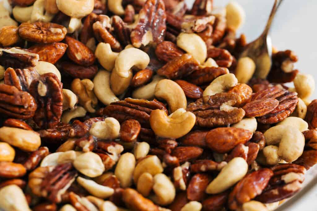 process shot of nuts mixed with egg white