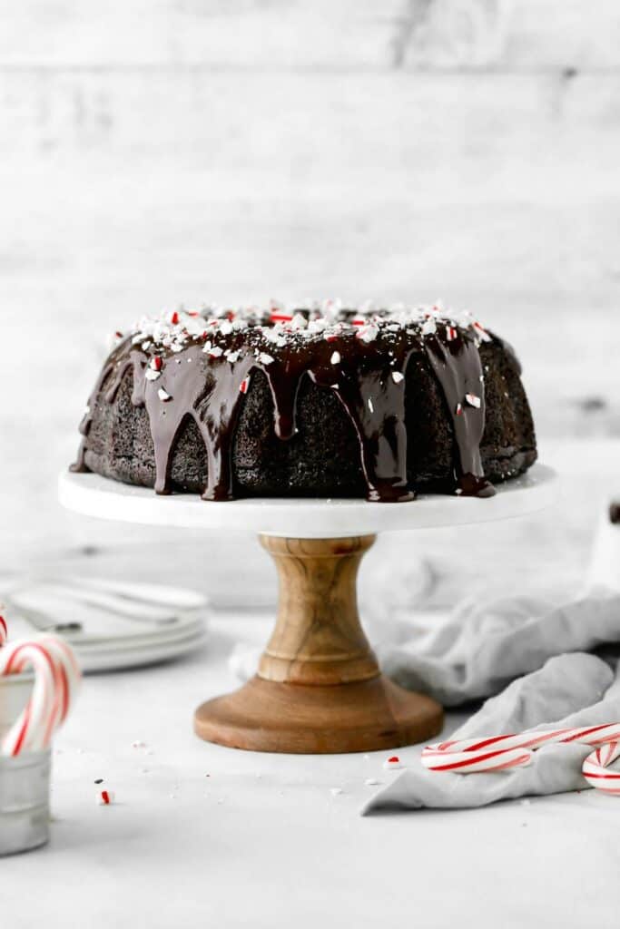 a chocolate peppermint bundt cake with a drizzle of chocolate ganache