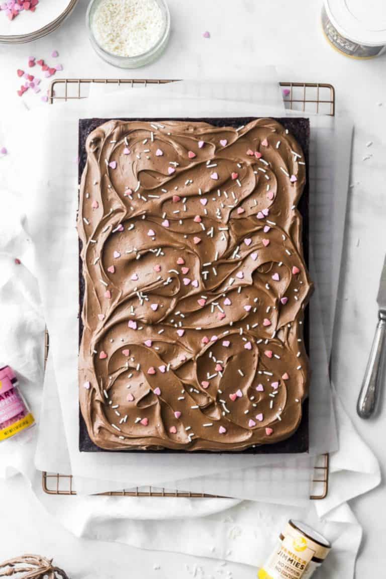 chocolate sheet cake with heart sprinkles and chocolate frosting