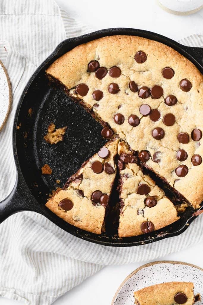 the top of a skillet cookie pie baked in a cast iron skillet