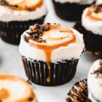 a guinness cupcake with caramel dripping down the side