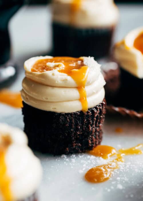 caramel dripping down the side of a Guinness cupcake