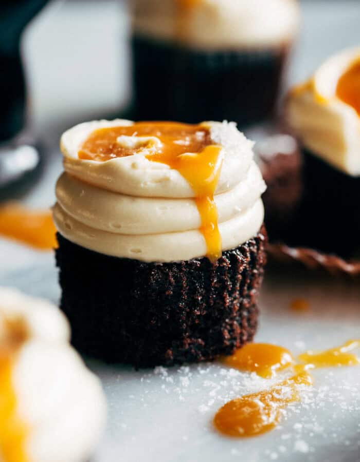 caramel dripping down the side of a Guinness cupcake