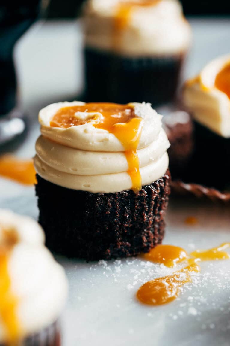 caramel dripping down the side of a Guinness cupcake