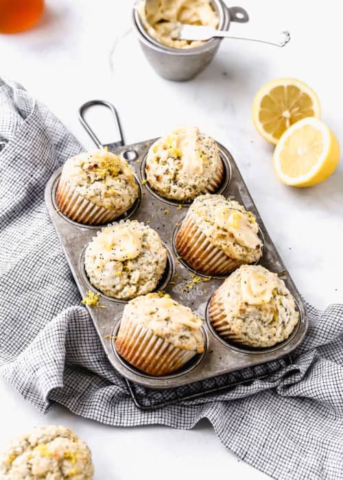 lemon poppy seed muffins in a muffin tin