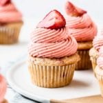 a strawberry cupcake on a tray