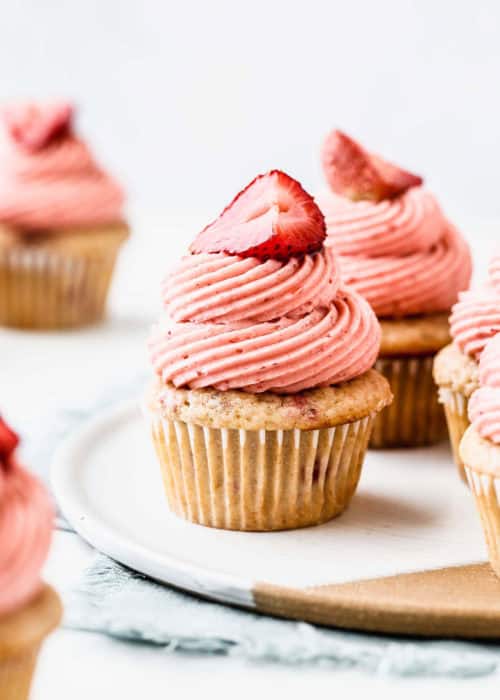 strawberry cupcakes on a ceramic plate