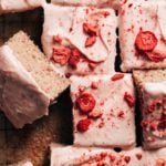 the top of a sliced strawberry sheet cake