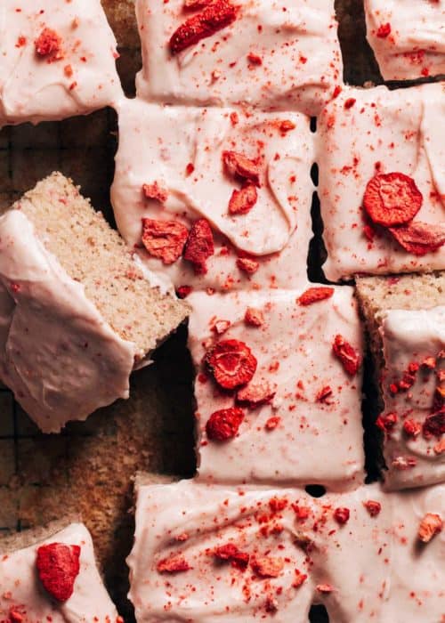 the top of a sliced strawberry sheet cake