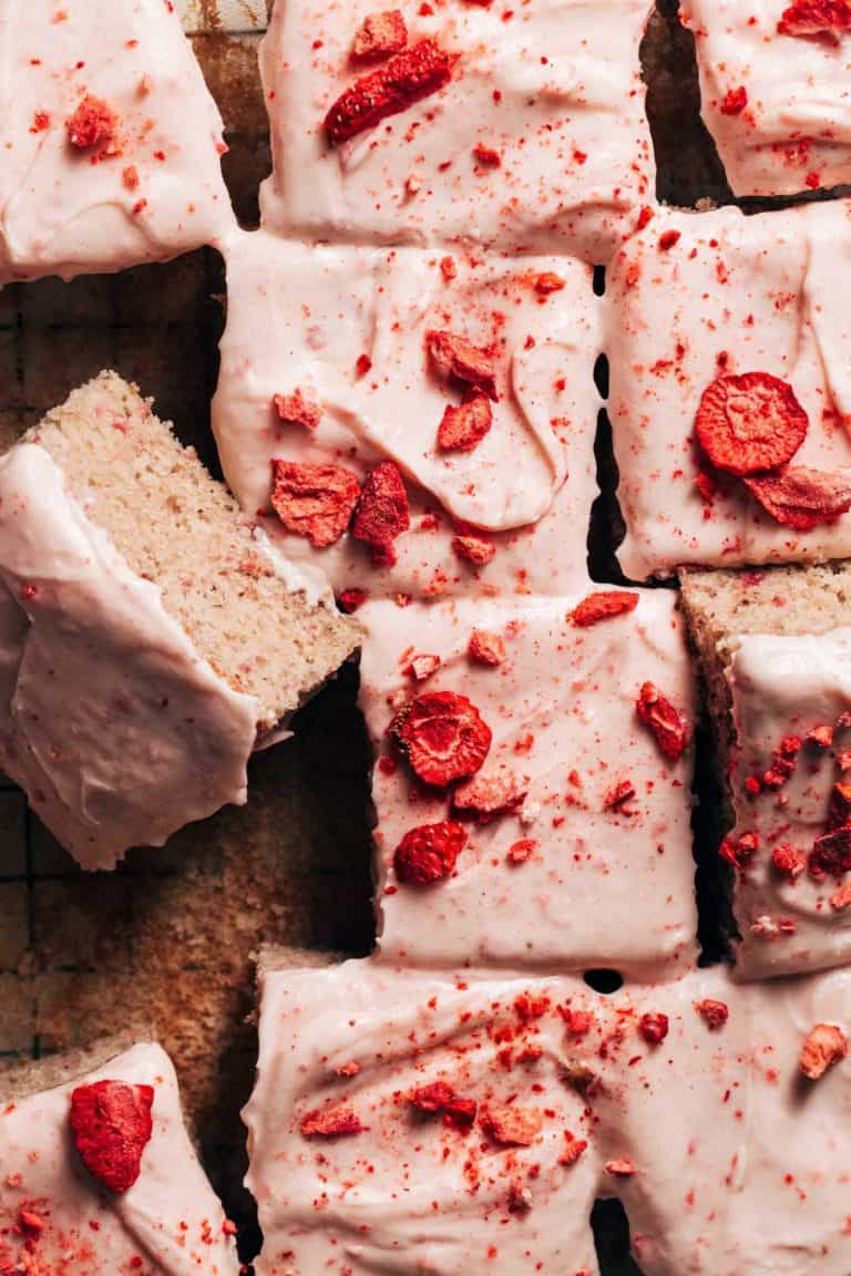 the top of a sliced strawberry sheet cake