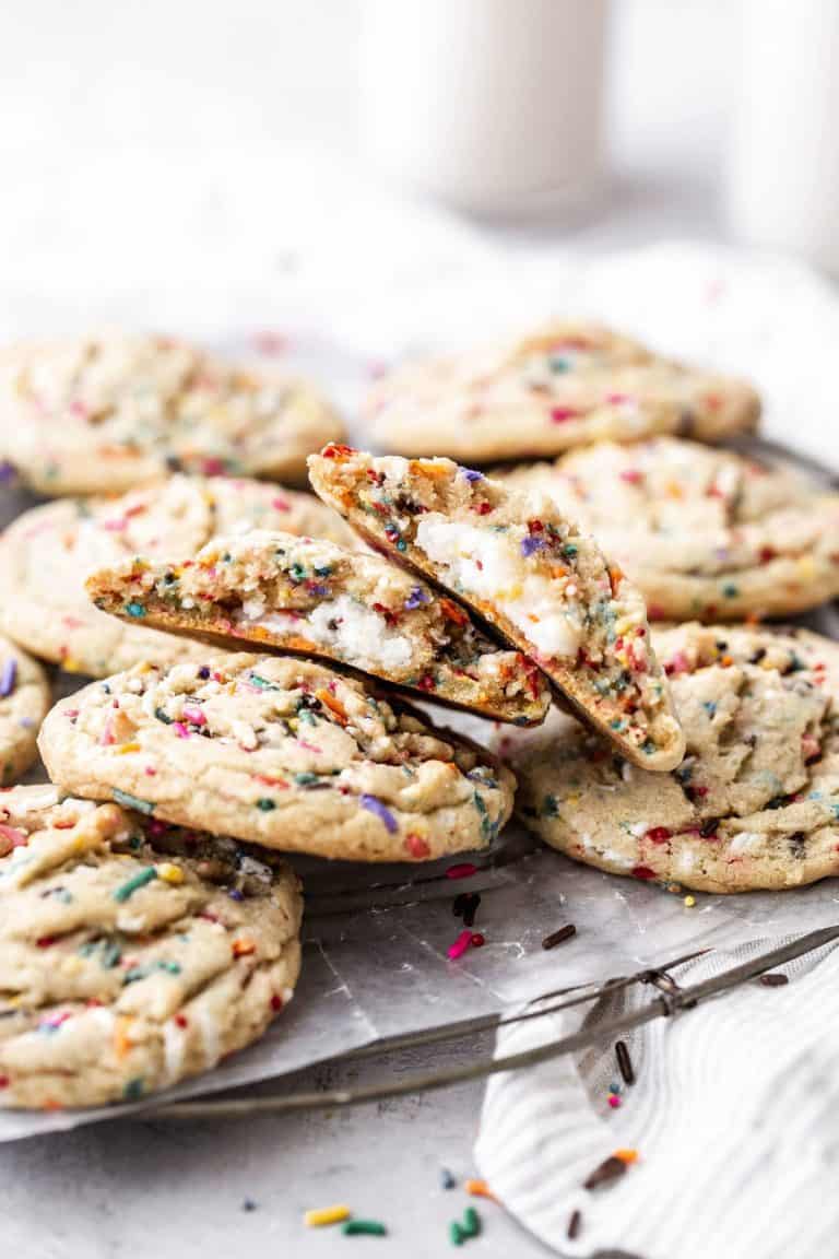 a center of a frosting filled funfetti cookie