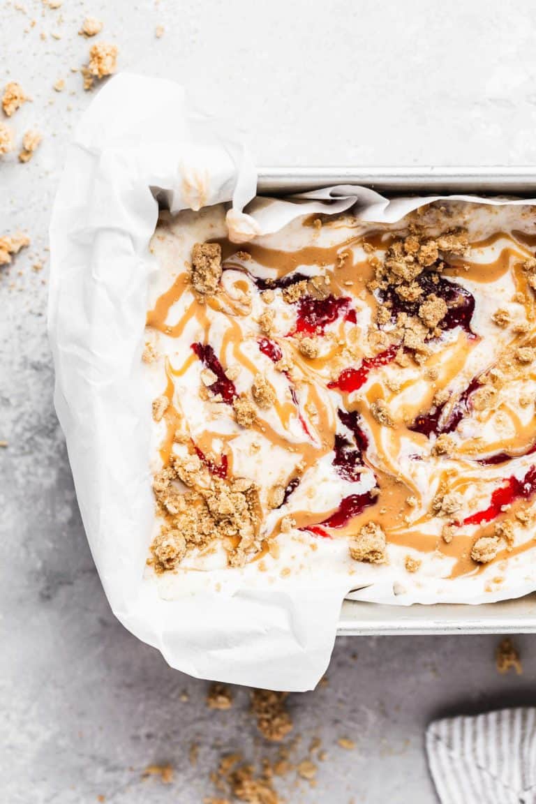 close up on a loaf pan filled with peanut butter and jelly ice cream