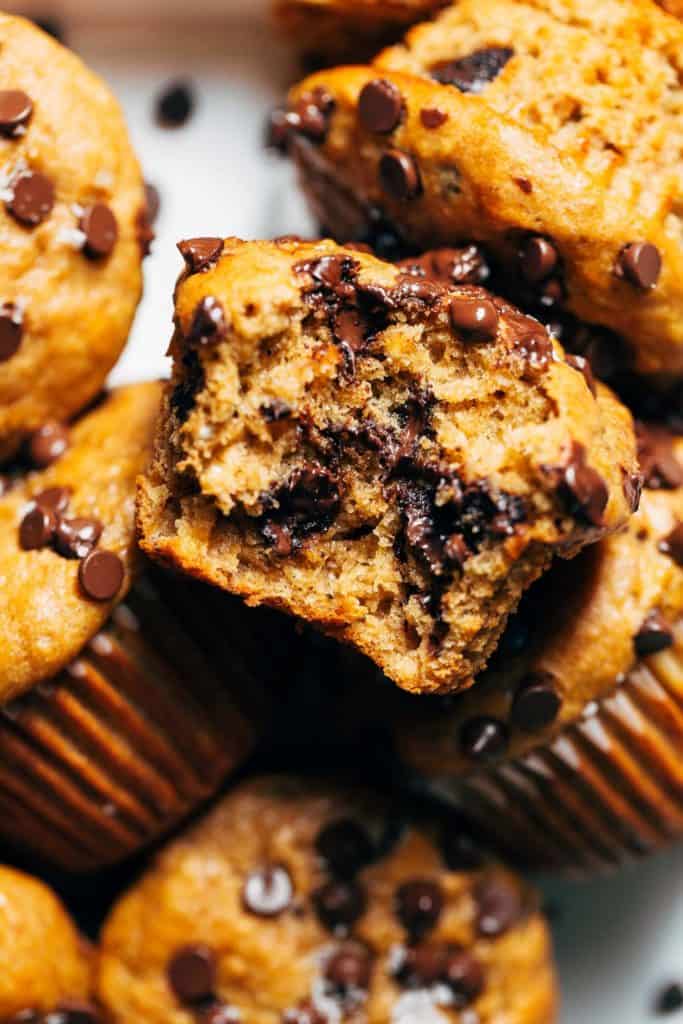 close up on a bite taken from a peanut butter banana muffin