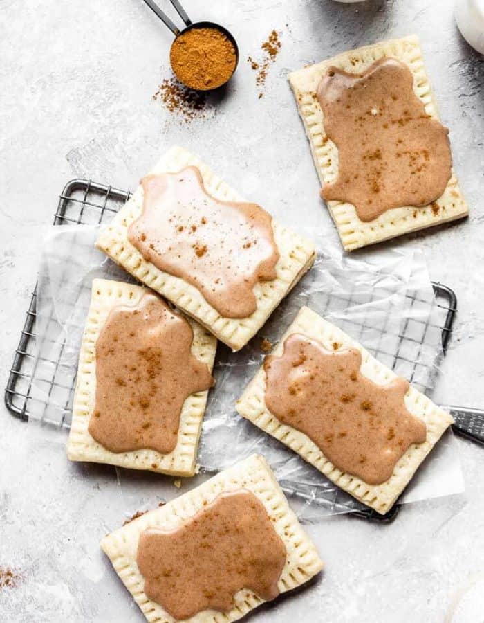 homemade brown sugar cinnamon pop tarts scattered on a wire rack