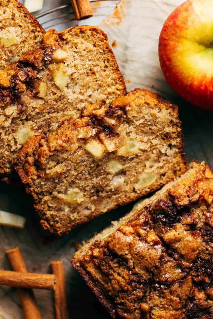 a slice of apple cinnamon bread with chunks of apples